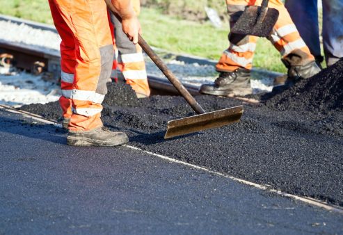 asphalt installing in road