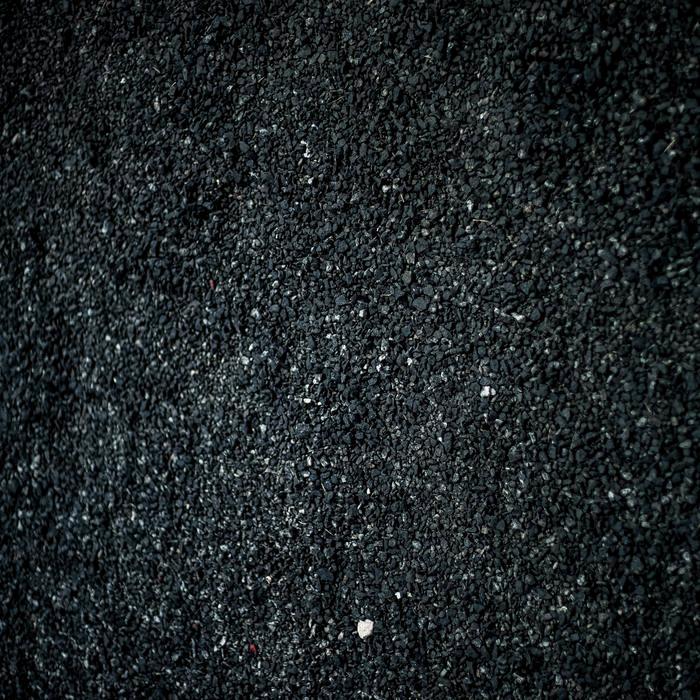 The close grain of a newly finished asphalt surface